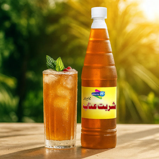 Sharbat e Anab Jawahirdar natural cooling herbal drink displayed with an iced glass and mint leaves in a fresh sunny background.