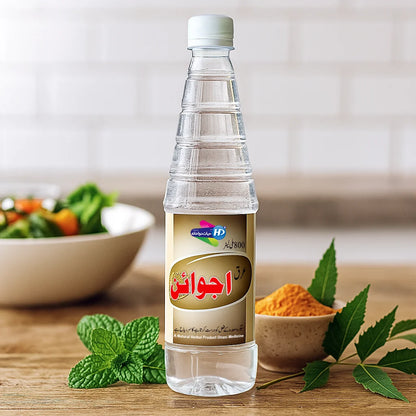 Hayat Dawakhana Arq e Ajwain digestive water shown with mint turmeric and herbal elements in a clean natural wellness setting.