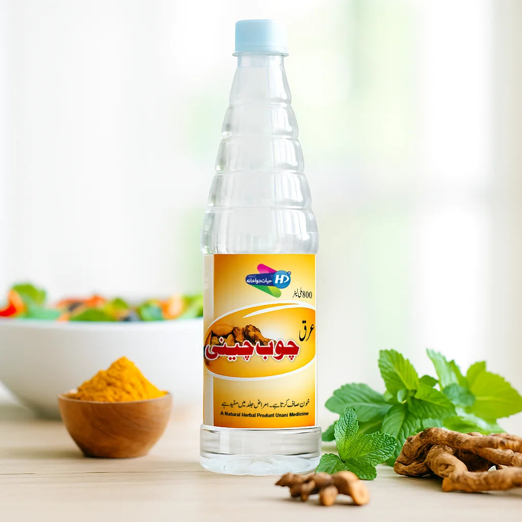 Arq e Chob Chini digestive and wellness tonic displayed with fresh mint turmeric and botanical herbs in a bright natural setup.