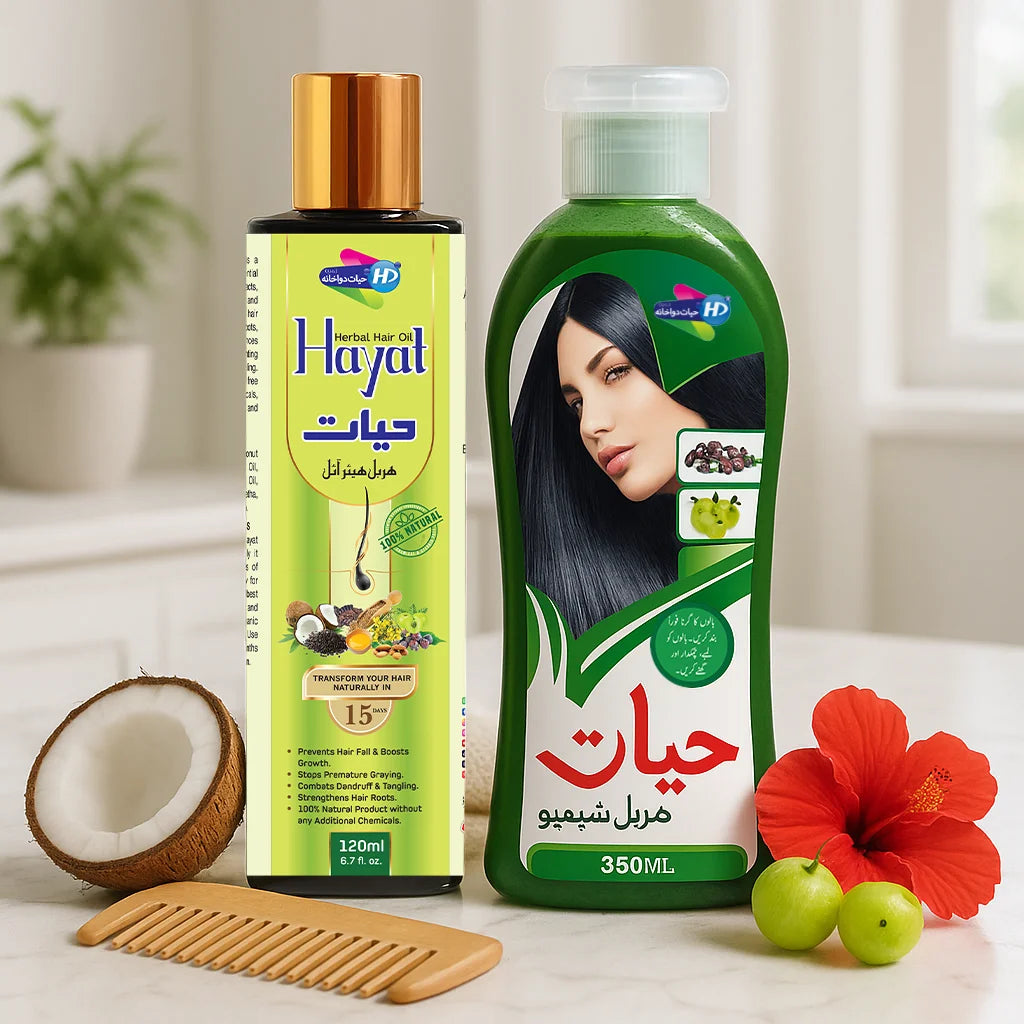Hayat Herbal Hair Oil and Hayat Herbal Shampoo bundle displayed with coconut, hibiscus flower, amla and wooden comb.