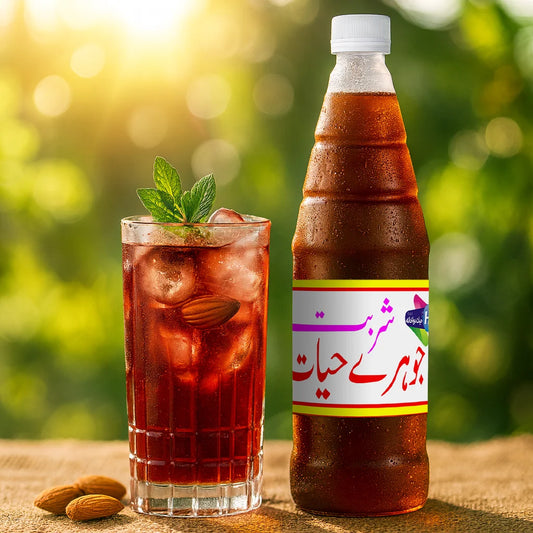 Bottle of Sharbat Johar-e-Hayat with a glass of iced red drink garnished with mint and almonds, placed on a wooden surface with a bright outdoor background.