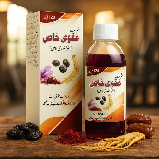 Sharbat Muqawi Khas Amber Kastori bottle and box placed on a wooden table with saffron, dates, ginseng, and herbal ingredients in a warm natural background.