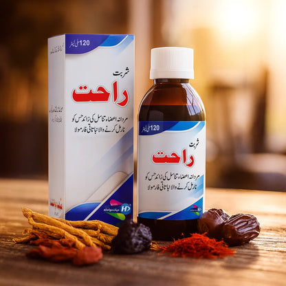 Sharbat-e-Rahat herbal tonic bottle and packaging shown with natural ingredients including dates, saffron, and roots on a wooden surface.