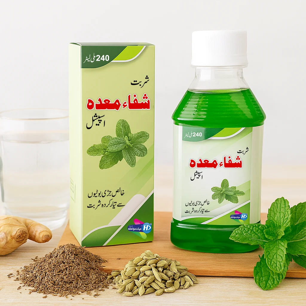 Hayat Dawakhana Shifa e Meda Special digestive syrup shown with mint fennel ajwain and ginger beside a glass of water in a clean wellness setup.